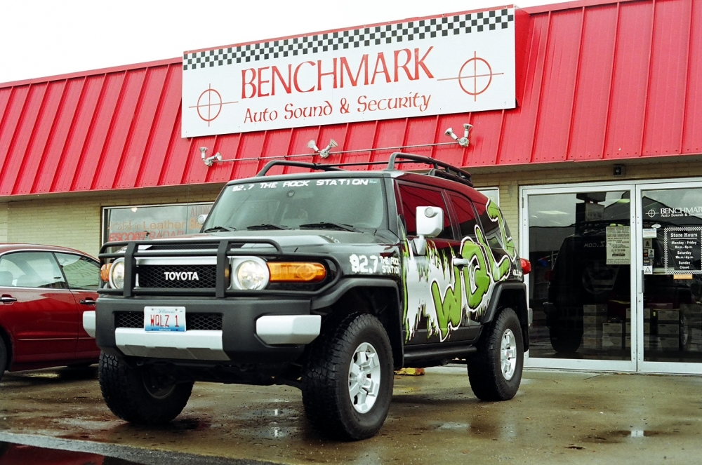 Custom Toyota outside of Benchmark Auto Sound storefront